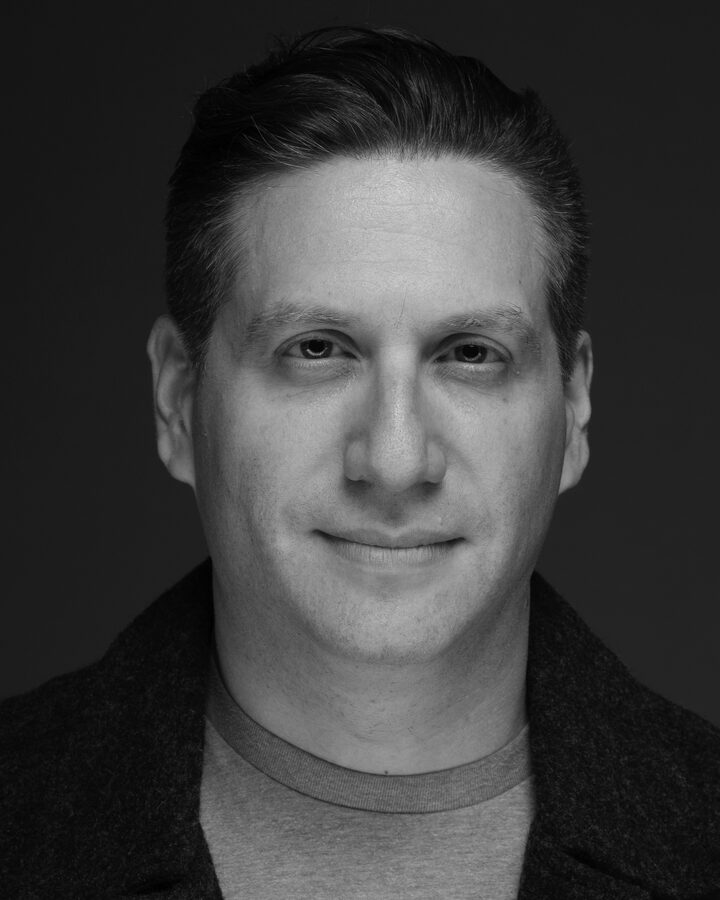 Shai Korman, in a black-and-white portrait